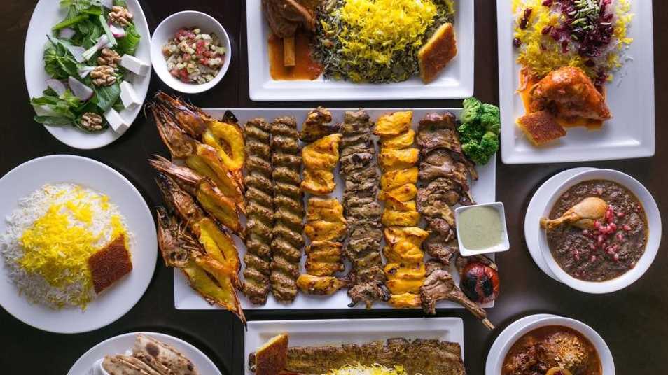 Discover the artful presentation of modern Persian dishes, where each plate is a canvas showcasing the vibrant colors and textures of Iran.